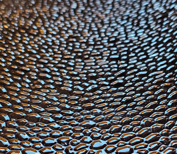 Réflecteur martelé